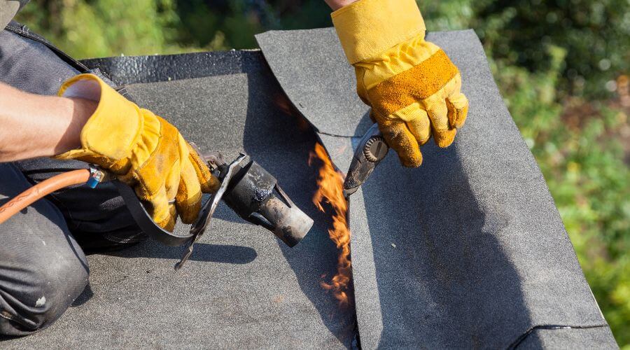 Professional gutter cleaning in Damon, TX